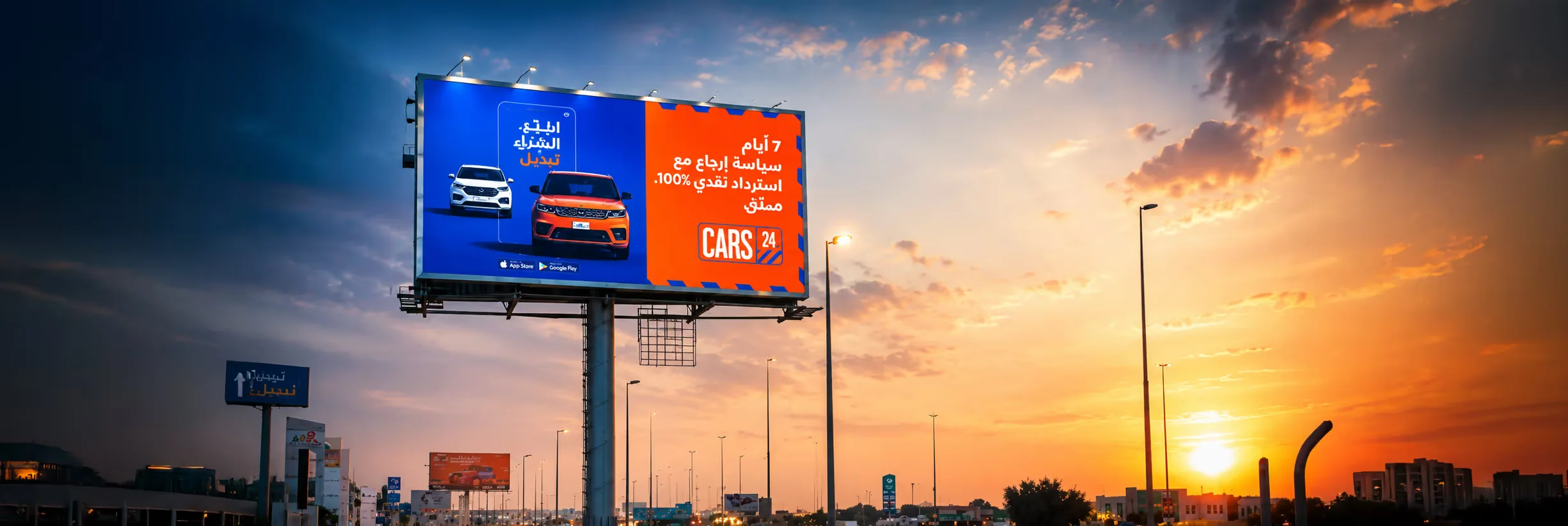 CARS24 outdoor billboard campaign at sunset